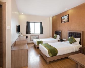 Treebo Trend Pal Comfort - Jamshedpur - Ložnice