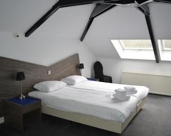 Hotel Oranjeoord - Hoog Soeren - Schlafzimmer