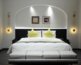New Good Hotel - Nantong - Habitación