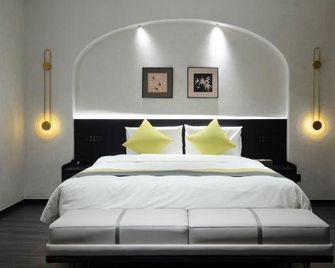 New Good Hotel - Nantong - Quarto