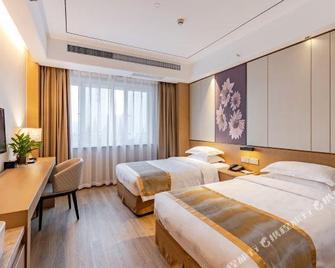 Baihua Hotel (Hefei Huaihe Road Pedestrian Street Xiaoyao Jin Store) - Hefei - Habitación