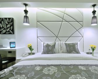 Sukhumvit Suites Hotel - Bangkok - Bedroom