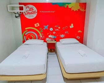 Citismart Bidadari Hotel - Pekanbaru - Ložnice