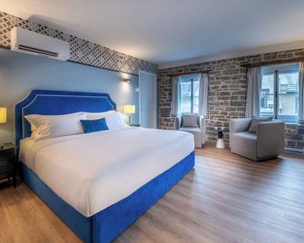 هوتل أكاديا - كويبيك ستي - غرفة نوم