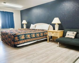 Studio Inn and Suites - גאלווואי - חדר שינה