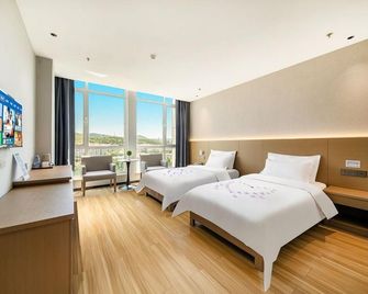 Hengyu Hotel (Weihai North Station Torch Eighth Street) - Weihai - Bedroom