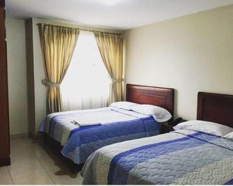 Hotel Caluva - Loja - Ložnice
