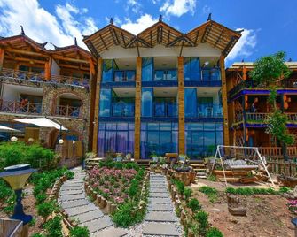 Lijiang Origin Inn Luguhu Branch - Lijiang - Edificio