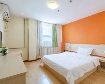 7 Days Inn Qingdao International Convention And Exhibition Center Zhuzhou Road Branch - تشينغداو - غرفة نوم