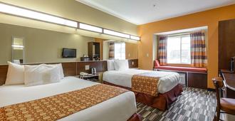 Microtel Inn & Suites by Wyndham Greenville/University Med - Greenville - Bedroom