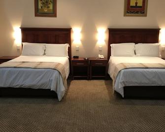 Global Village Guest House - Nelspruit - Bedroom