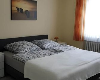 Ferienwohnung Am Schlosspark - Melsungen - Camera da letto