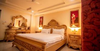 Urban Rose Hotel & Apartments - Dar Es Salaam - Yatak Odası