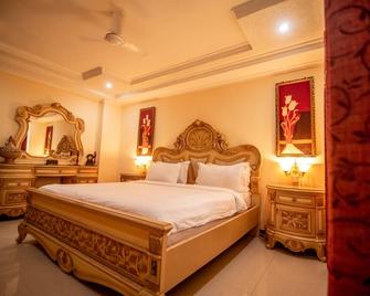 Urban Rose Hotel & Apartments - דר א-סאלאם - חדר שינה