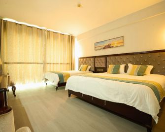 Oriental Garden Hot Spring Hotel (Xinglong Tropical Botanical Garden Branch) - Wanning - Ložnice