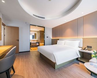 Wassim Hotel - האנגג'ואו - חדר שינה