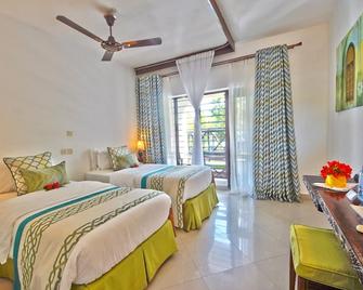 Papillon Lagoon Reef Hotel - Ukunda - Schlafzimmer