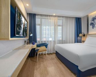 Kyriad Marvelous Hotel Changsha Wuyi Plaza Xiangya - צ'נגשה - חדר שינה