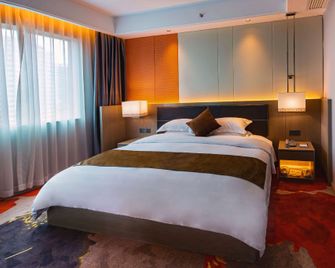 Jinhua Hotel (Chaoyang Square, Nanning Railway Station Branch) - Nanning - Bedroom