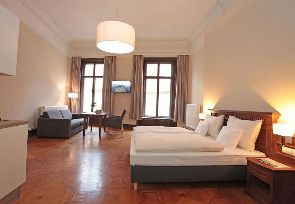 Apartments Altes Konsulat - سترالسوند - غرفة نوم