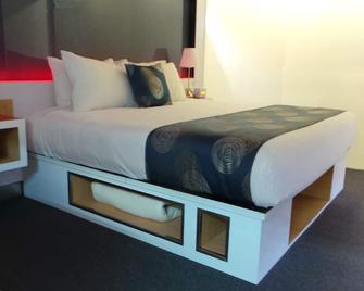 Room Motels Gympie - Gympie - Bedroom
