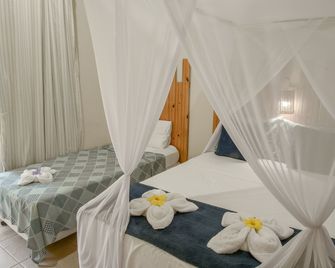 Pousada Sonhos de Praia, Fácil Acesso a Praia, Rua Mucugê e Beco das Cores - Arraial d'Ajuda - Bedroom