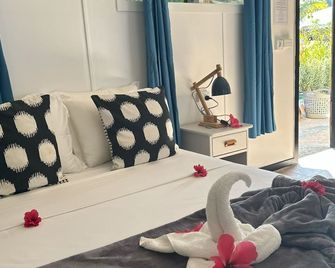 Garden Reef Bungalows - Saraotou