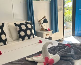 Garden Reef Bungalows - Saraotou