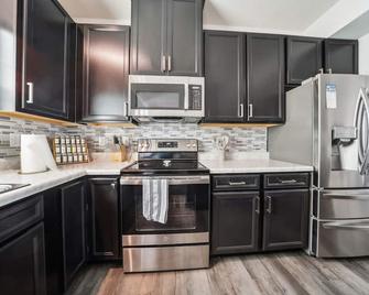 Veiled Secrets- Unraveling the Mystery of Solitude home - Willoughby - Kitchen