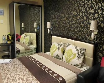 Hajjah Ririn's Kebagusan City Apartment - Yakarta - Habitación