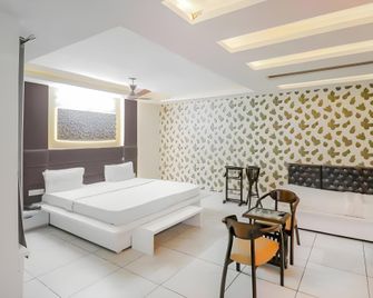 Super Hotel O Vivaan Residency - Rohtak - Bedroom