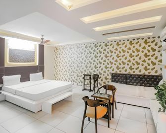 Super Hotel O Vivaan Residency - Rohtak - Bedroom