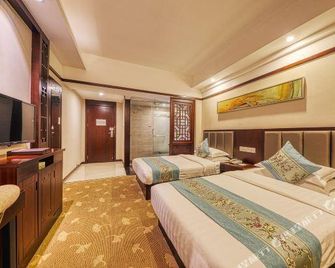 Ali Hotel (Yichang Jiefang Road Pedestrian Street Cbd Shopping Center) - Yichang - Schlafzimmer
