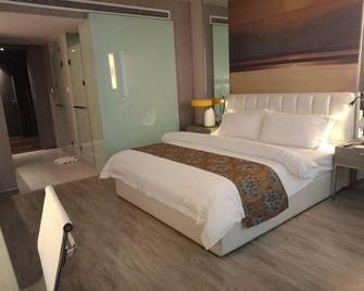 Jinjiang Metropolo Hotel - Turpan Administration Center - Turpan - Bedroom