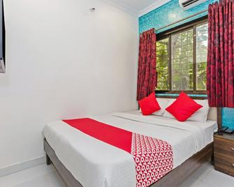 Hotel O The United Hotel - Mumbai - Bedroom