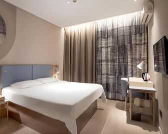 Home Inn - Zibo - Slaapkamer