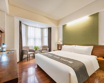 Pesht Hotel - Baoji - Schlafzimmer