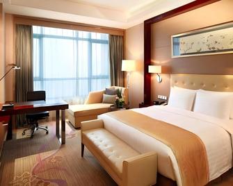 Greentree Inn Shandong Jining Weishan Lake International Wetland Park Business Hotel - Zaozhuang - Schlafzimmer
