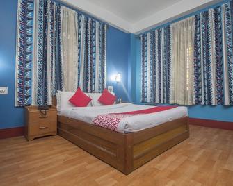 Oyo 26748 Palkyi Lodge - Kālimpong - Bedroom