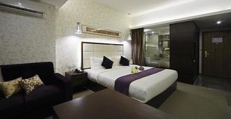 Xiamen Jinglong Hotel - Xiamen - Sypialnia