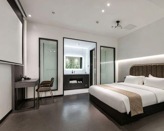 Shangchengyun Hotel(Chongqing Gangcheng Industrial Park Store) - Chongqing - Bedroom