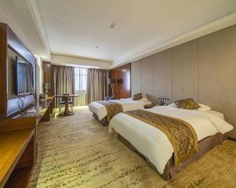 Qinglong Hotel - Yichun - Habitación