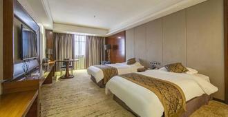 Qinglong Hotel - Yichun - Bedroom