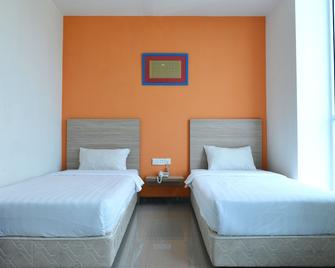 Hotel Fresh One - Batam - Slaapkamer