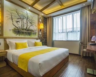 Home Of Heart Inn - Zhangjiajie - Bedroom