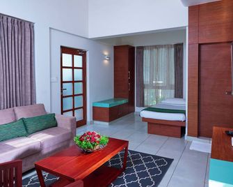 The Woods Resorts Wayanad - Koleri - Sala de estar