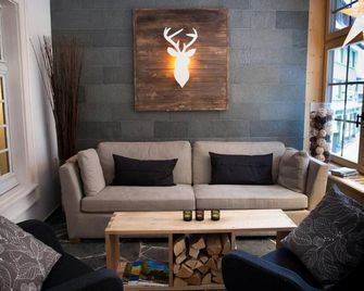 SPANNORT family home with common kitchen and self check-in - Engelberg - Living room