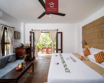 Victoria Xiengthong Palace - לואנג פראבאנג - חדר שינה