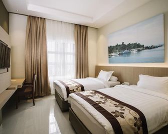 ساهيد باتام سنتر هوتل آند كونفينشن - باتام كوتا - غرفة نوم