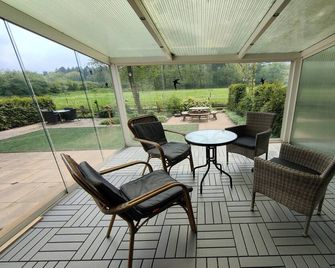 Glass Veranda Chalet in nature - Garderen - Balcon